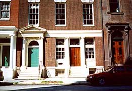 [photo, adjacent doorways, West Madison St., Baltimore, Maryland]